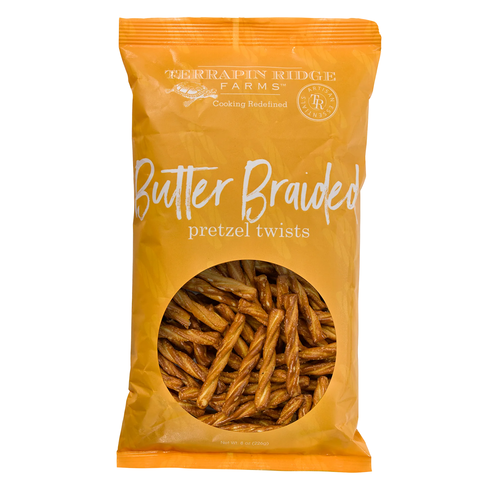 A bag of Terrapin Ridge Braided Pretzel Twists on a white background, accompanied by Nashville Hot spice and creamy mustard.