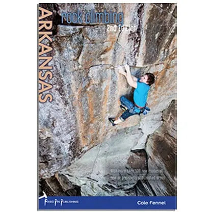 Sentence with product name: Book cover titled "Rock Climbing Arkansas 2nd Edition" showing a person scaling a steep rock face.