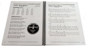 A Cigar Box Guitar Songbook Children's Favorites with traditional tunes tablature on it.