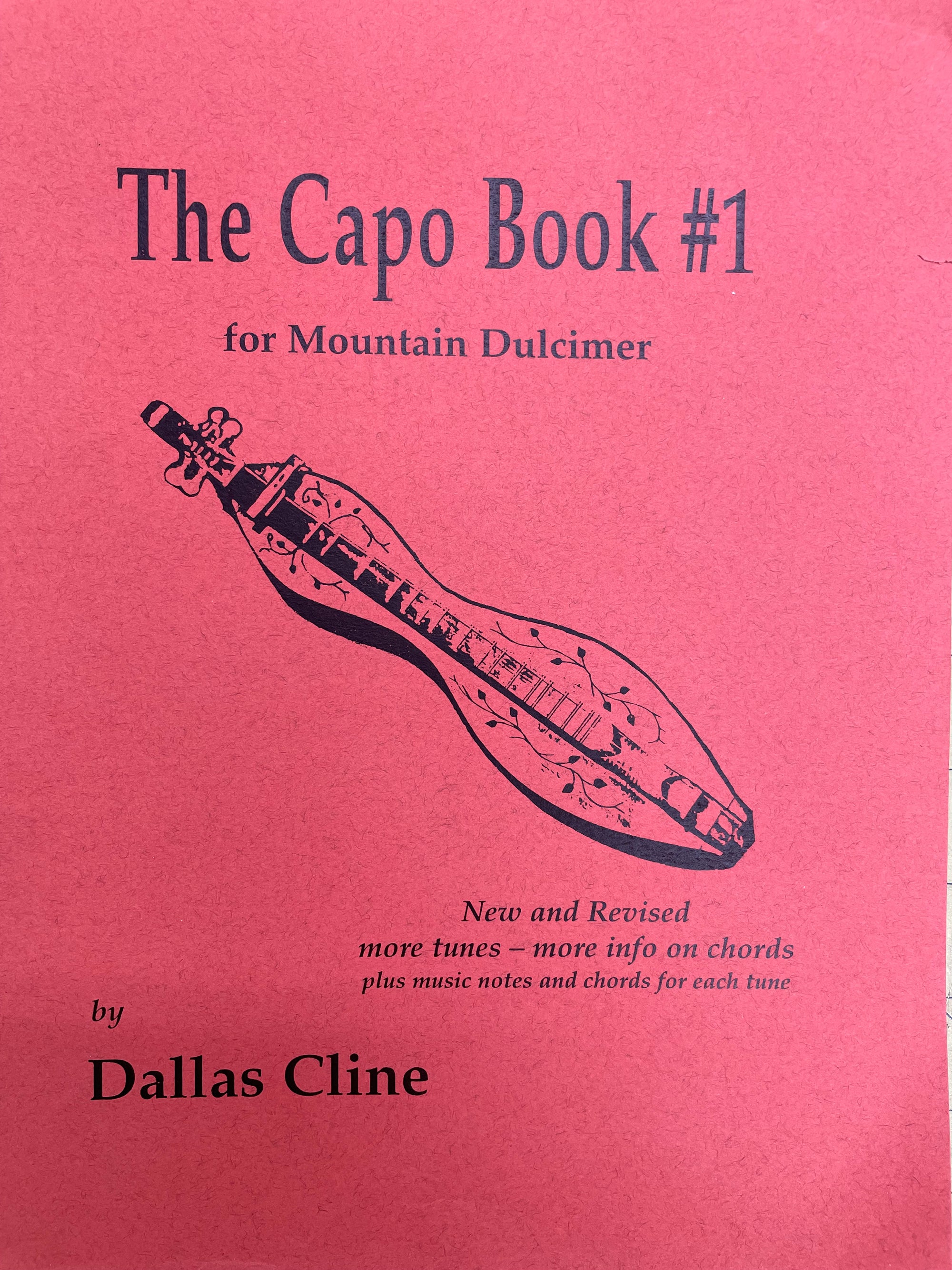 Cover of "The Capo Book #1 for Mountain Dulcimer" by Dallas Cline, featuring an illustration of a capo on a pink background.