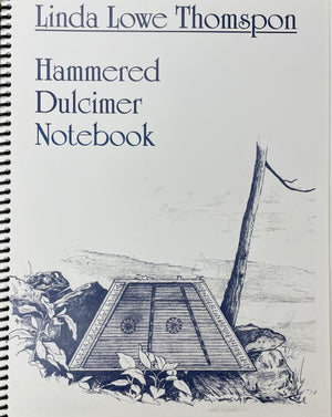 Sentence with Product Name: Cover of the "Hammered Dulcimer Notebook" by Linda Lowe Thompson, featuring a sketch of a hammered dulcimer among rocks and a lone tree, inspiring the creative player to embellish melodies.
