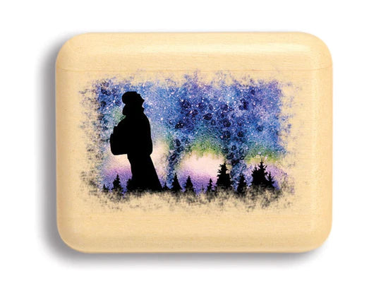 Silhouette of a 2" Star Gazing Hiker Secret Box standing against a colorful cosmic background with stars, printed on a wooden canvas.