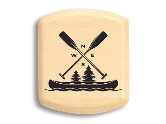 A 2" Navigation Canoe Aspen Secret Box from an organization, featuring a canoe, paddles, and compass design.