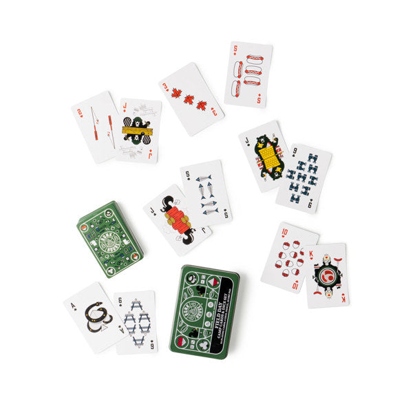 Scattered Bunkhouse Field Day Camp Cards & Dice Set with unique illustrations and symbols on a white background.