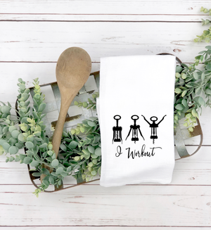A family-themed I Workout tea towel featuring a wooden spoon, perfect for the wine-lover or kitchen enthusiast.