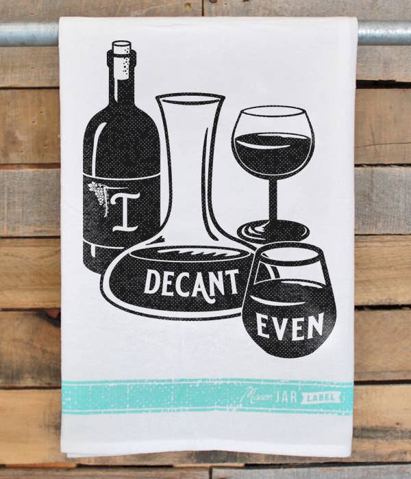 A "Tea Towels I Decant Even" vintage-feel cotton tea towel featuring a bottle of wine and a wine glass.