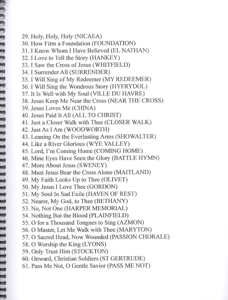 A spiral-bound booklet displaying a list of song titles numbered 29 to 61, including hymns for beginners like "Holy, Holy, Holy," "How Firm a Foundation," and "Pass Me Not, O Gentle Savior," arranged in traditional melody/drone style: Hymns for the Beginning Mountain Dulcimer Player (DAA) by Tom Arnold.