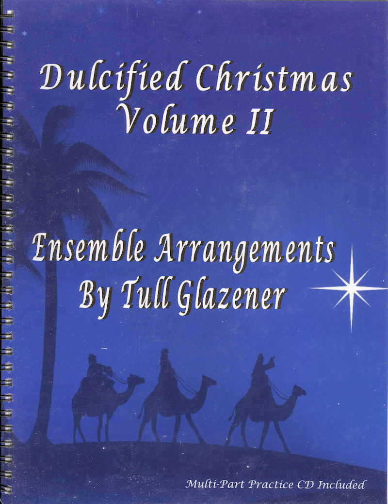 Blue cover of a music book titled "Dulcified Christmas Volume II - by Tull Glazener," featuring silhouettes of three camels and riders under a starry sky, with a palm tree. Ideal for mountain dulcimer enthusiasts, this edition includes D-A-D tuning Christmas arrangements.