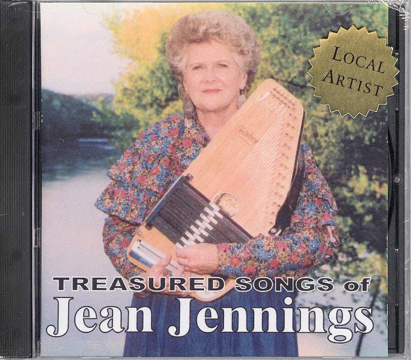 Woman holding a zither on a cd cover titled "Treasured Songs of Jean Jennings" with a 'local artist' label.