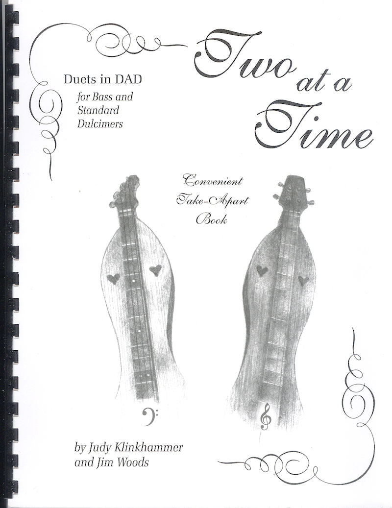 Discover the melodic enchantment of the mountain dulcimer as you delve into "Two at a Time - by Judy Klinkhammer and Jim Woods," a captivating book set filled with insightful tips on tuning and playing this stringed instrument. Explore the world of dul
