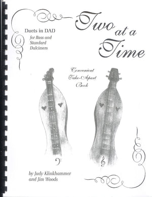 Discover the melodic enchantment of the mountain dulcimer as you delve into "Two at a Time - by Judy Klinkhammer and Jim Woods," a captivating book set filled with insightful tips on tuning and playing this stringed instrument. Explore the world of dul