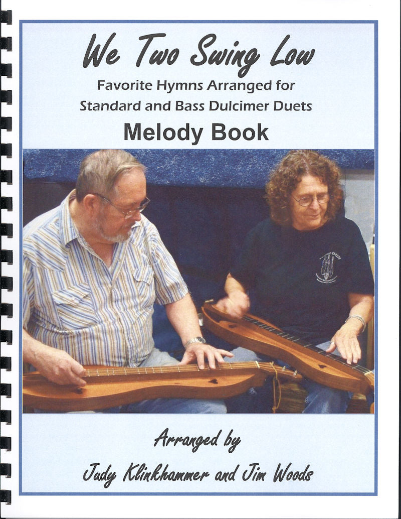 Cover of "We Two Swing Low by Judy Klinkhammer and Jim Woods" music book showing two people playing mountain dulcimers in DAD tuning, titled as standard and bass dulcimer duets arranged by Judy Klink.