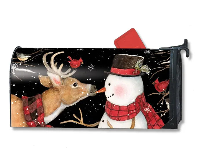 A UV-printed Studio M Mailbox Wraps mailbox cover featuring a deer and a snowman.