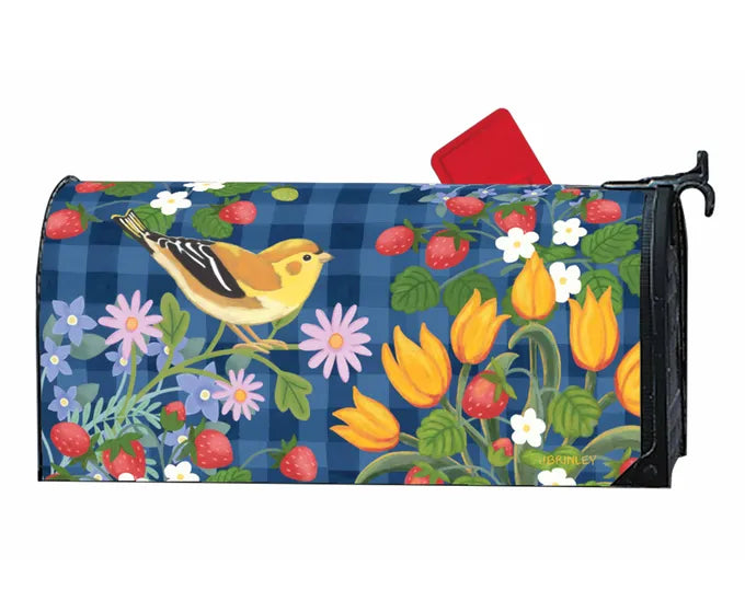 A UV-printed Studio M Mailbox Wraps featuring a bird and flowers on it.