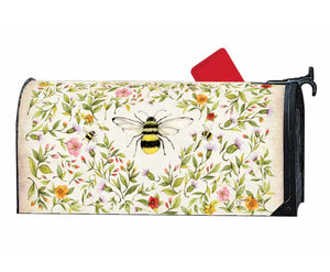A Studio M Oversized Mailbox Wrap with a bee on it.