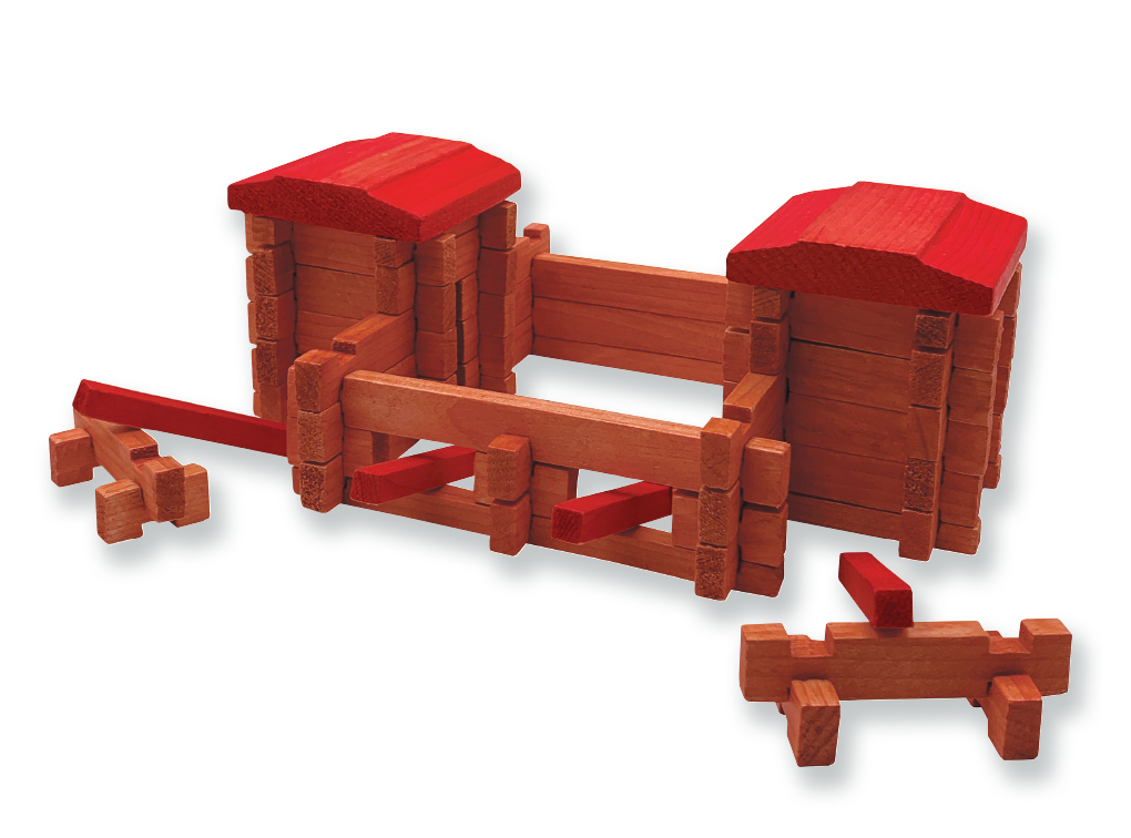 A Roy Toy Fort Canvas Bag with two red-roofed towers and an incomplete wall structure, featuring additional all-wood pieces laid out in front, makes for an excellent educational toy.