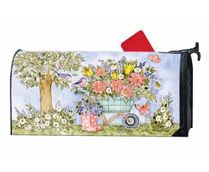 A UV-printed Studio M Mailbox Wraps featuring beautiful flowers and a wheelbarrow. Perfect for MailWraps enthusiasts.