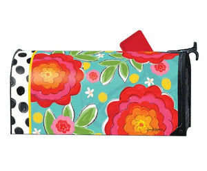 A Studio M Mailbox Wraps magnetic mailbox cover with colorful florals and polka dots.
