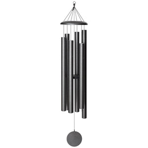 The Corinthian Bells® 65-inch Windchime - Wholesale is crafted in black metal with five cylindrical tubes, a circular top, and a round wind catcher below, delivering deep resonance.