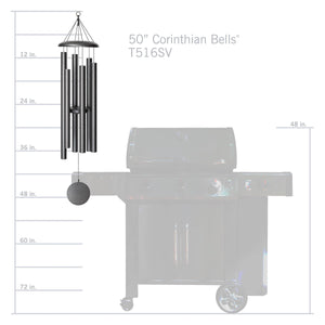 A bbq grill with a Corinthian Bells® 50-inch Windchime on it, producing soothing chime tones in the breeze.