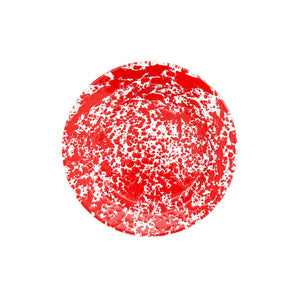 The Splatter Enamelware Dinner Plate showcases a vibrant red splatter pattern over a crisp white base, infusing your serveware collection with a lively pop of color. Its design, inspired by classic enamelware, creates a striking contrast against the bright white background.