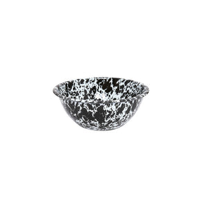 The Splatter Enamelware Small Serving Bowl features a classic black and white marbled design, a round shape, and a flared rim, making it perfect for stylish serveware; shown isolated on a white background.