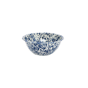 The Splatter Enamelware Small Serving Bowl, part of classic enamelware serveware, features a blue and white speckled pattern and sits elegantly on a white background.