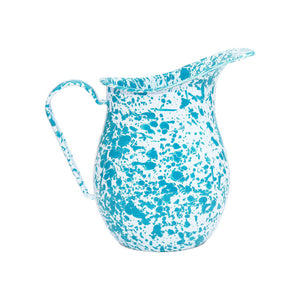 The Splatter Enamelware Large Pitcher, featuring a blue and white splatter pattern with a handle and wide pouring spout, is displayed against a white background.