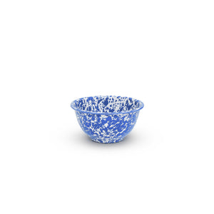 The Splatter Enamelware Small Footed Bowl is a small, round blue bowl with a charming white speckled pattern, perfect for serving dip to children.