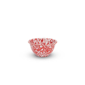 The Splatter Enamelware Small Footed Bowl, featuring a charming red-and-white speckled design, is centered against a plain white background, making it perfect for serving dip.