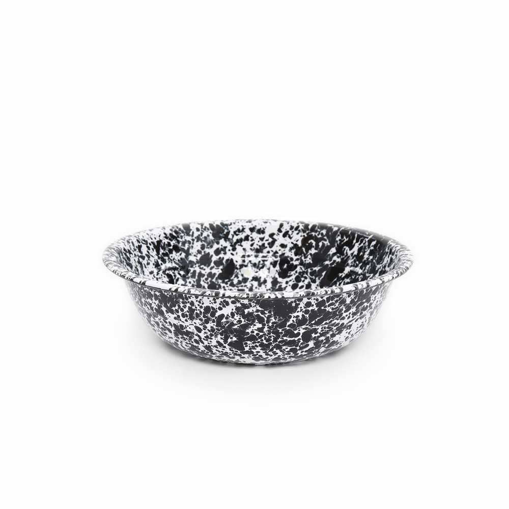 A Splatterware enamelware small basin with a black and white speckled design, 4 qt capacity, and 12.25" diameter on a white background.