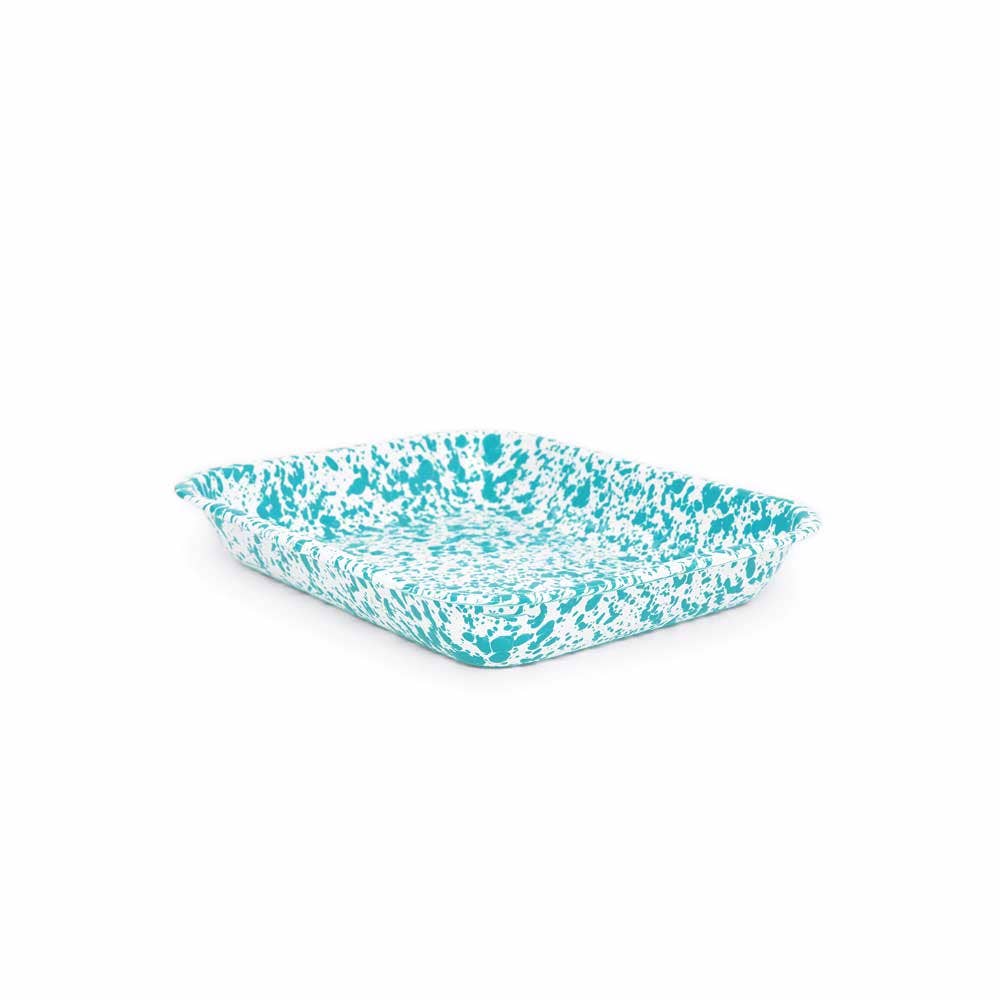 The Splatter Enamelware Large Open Roaster, featuring a unique turquoise and white marbled design and slightly raised edges, is elegantly displayed on a white background. Not only is it durable, but it is also easy to clean.