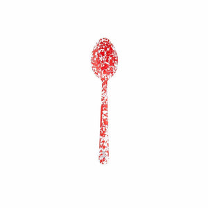 The Splatter Enamelware Large Serving Spoon, featuring a vibrant red color with a chic white speckled pattern, sits gracefully on a plain white background – perfect for entertaining.