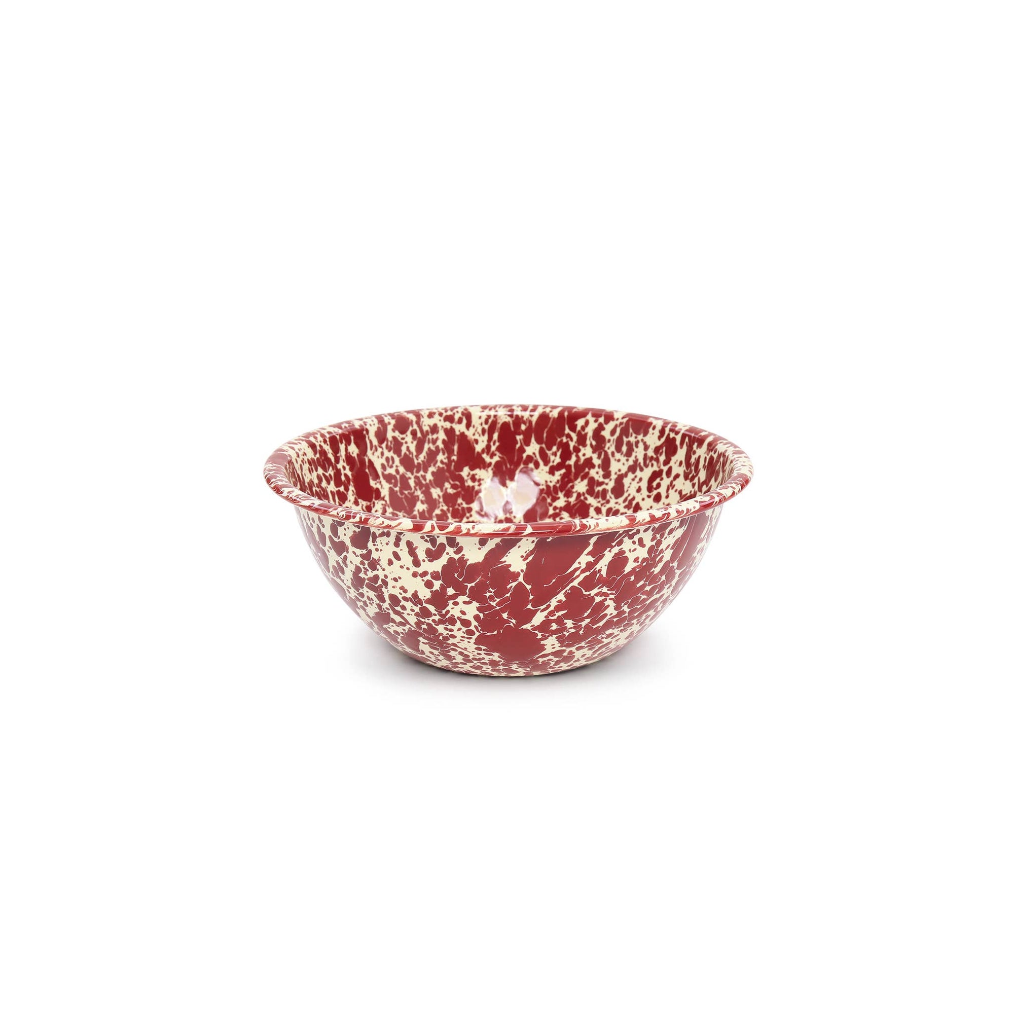 A small serving bowl featuring a red and white splattered pattern, part of our vibrant enamelware collection.