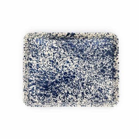 A large rectangular tray from the Splatter Enamelware collection, showcasing a blue and white splatter pattern and sleek porcelain finish.