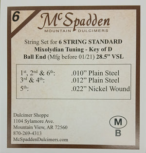 Label for the 6 String Standard Mixolydian String Set BALL End detailing specifications and materials for a 6-string standard in D-A-D tuning, key of D, with plain steel and nickel wound Ball End strings.