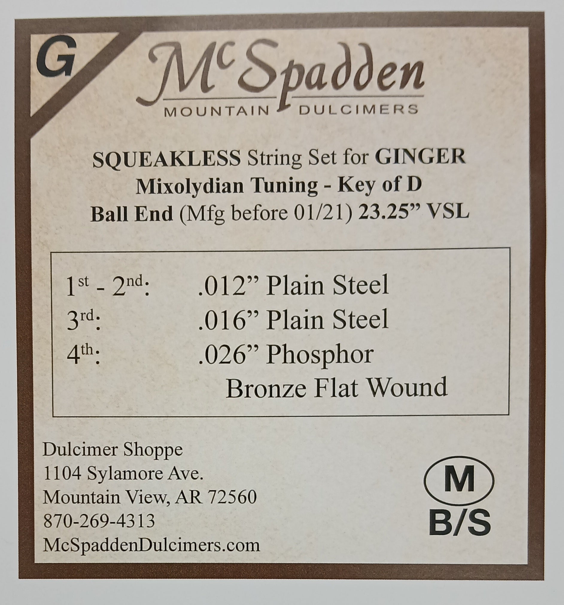 Label for McSpadden Mountain Dulcimers features the Ginger Squeakless Key of D STRING SET BALL End with Phosphor Bronze Flat Wound for Mixolydian tuning. Includes contact information for Dulcimer Shoppe in Mountain View, AR.