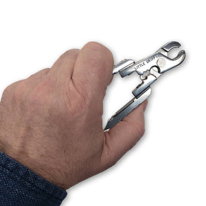 Sentence updated: Hand holding a Little Grippy Pliers Multi-tool, isolated on a white background.