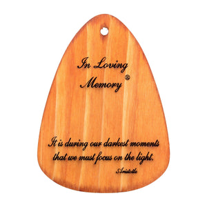 A personalized wooden plaque with the words "In Loving Memory® Bronze 18-inch Windchime", serving as a memorial tribute.
