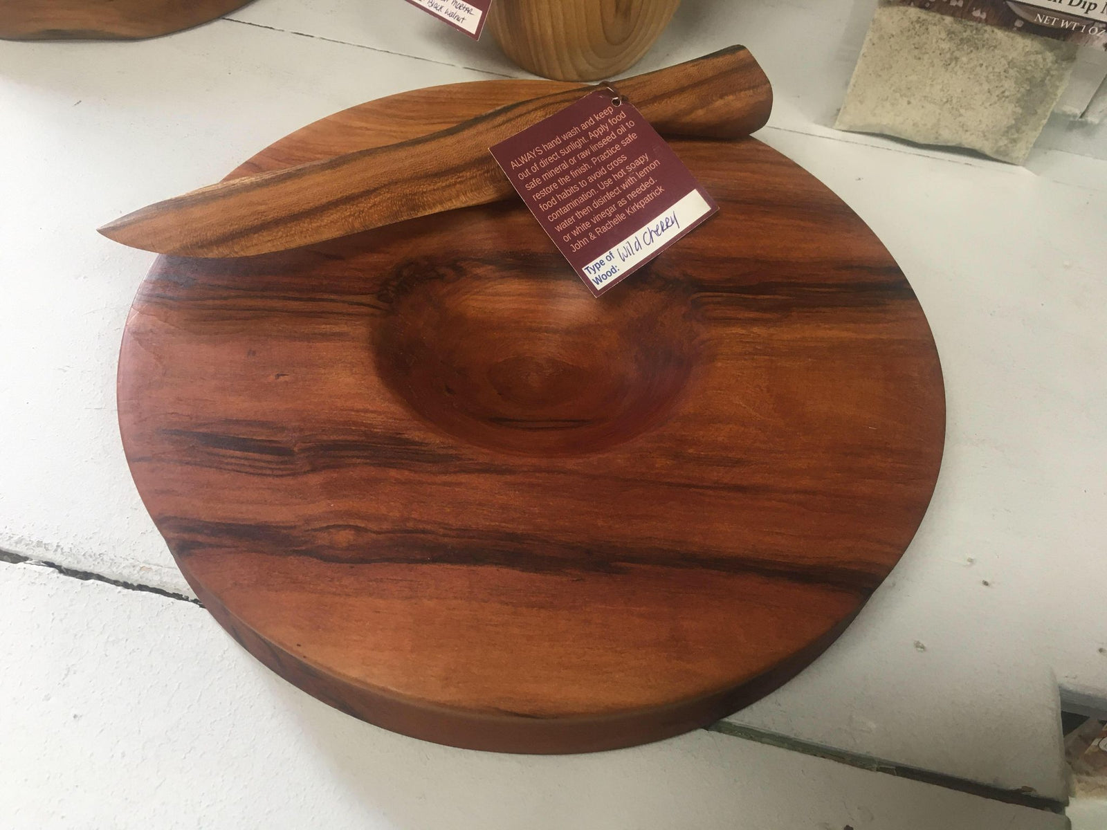 A handmade Cheeseball Board with Knife, perfect for eco-consciousness.