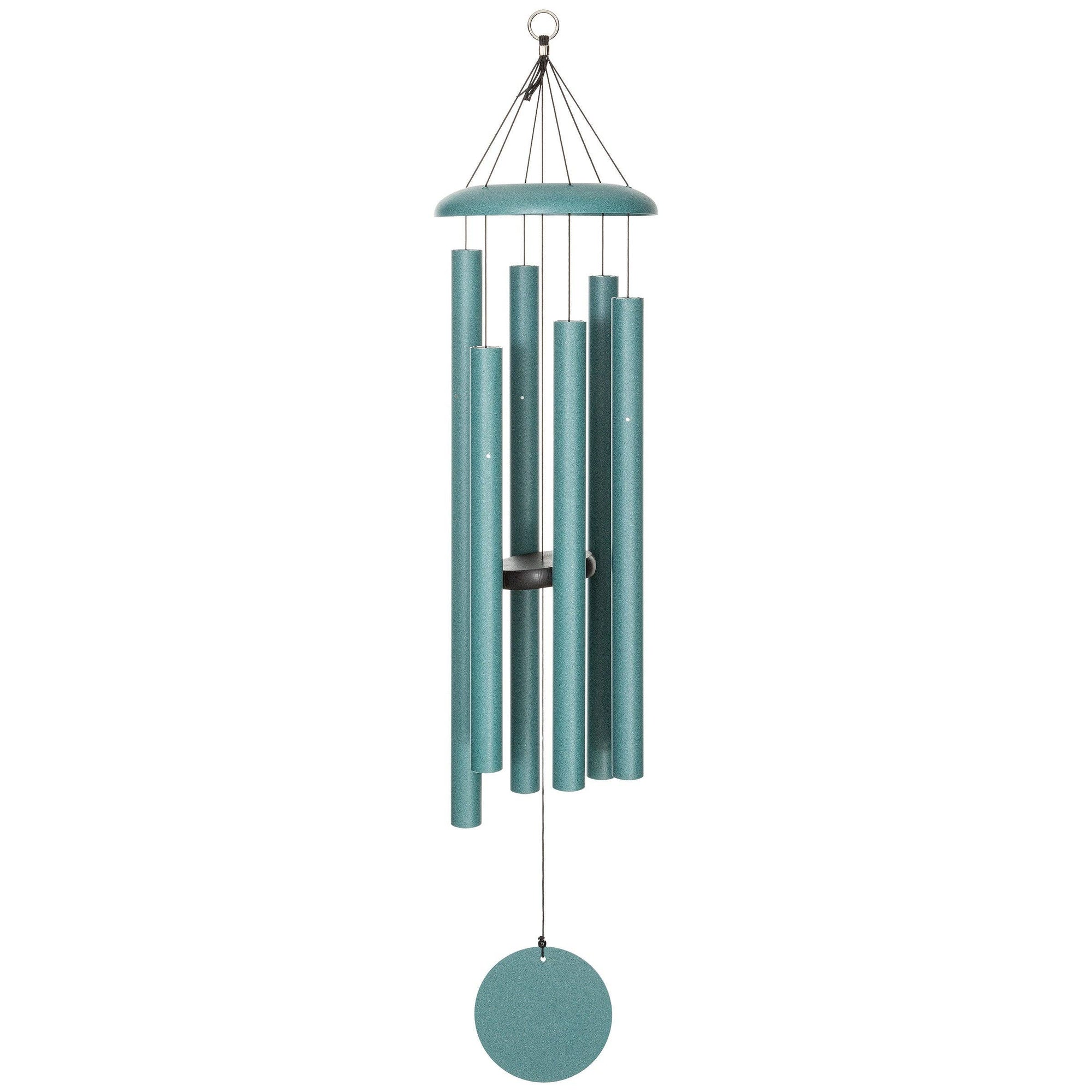 The Corinthian Bells® 44-inch Windchime, featuring a teal color with several cylindrical tubes hanging from a circular top and a round disc at the bottom, adds depth and flair to any outdoor space.