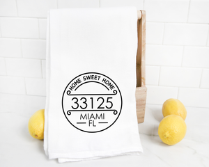 A personalized Zip Code Tea Towel with the word "Miami" on it.