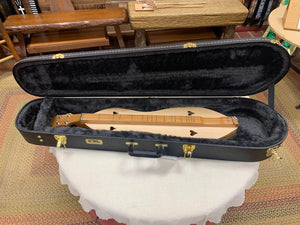 A black Premier Dulcimer Hardshell Case with a musical instrument inside, featuring a Rigidlite construction for added durability and protection. Comes with a Limited Lifetime Warranty for peace of mind.
