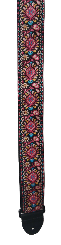 The Electric Pink Guitar Strap features a vibrant, symmetrical floral embroidery on a black background, finished with durable leather ends.