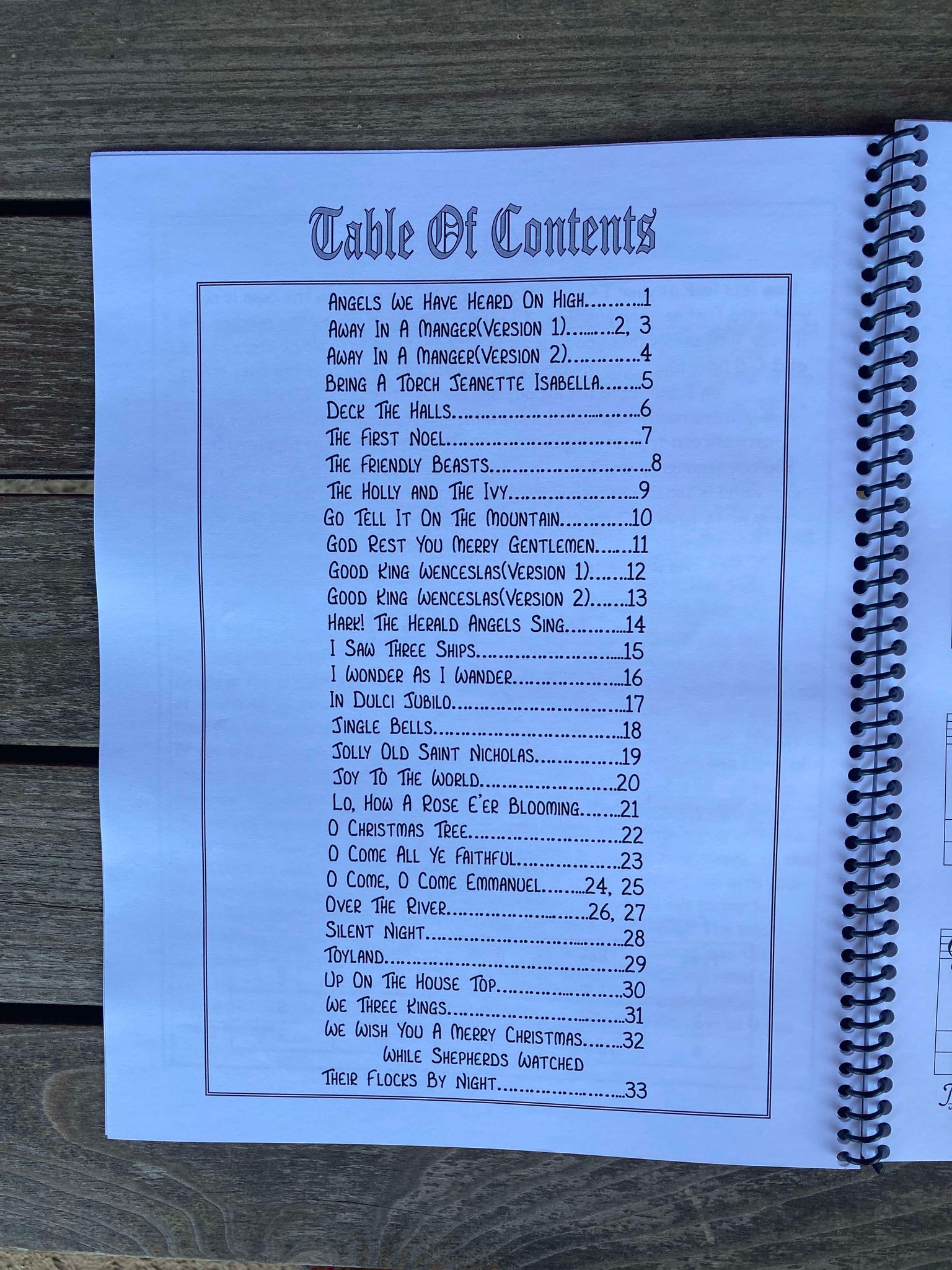 The table of contents in "A Collection of Christmas Songs by Red Dog Jam (Giger)" lays out Christmas tunes in D-A-D format, perfect for the mountain dulcimer, beautifully leading you through the pages from 1 to 33.