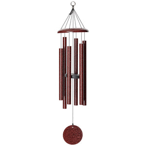 The Corinthian Bells® 36-inch Windchime is a versatile red wind chime that features six cylindrical tubes, a circular top, and a round wind catcher hanging below. It is perfect for enhancing any landscape design.