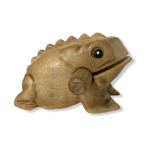 The Natural wooden frog, a high-quality percussion instrument handcrafted in Thailand, takes the shape of a croaking frog with a stick resting in its mouth and produces sound when the stick is scraped across its back.