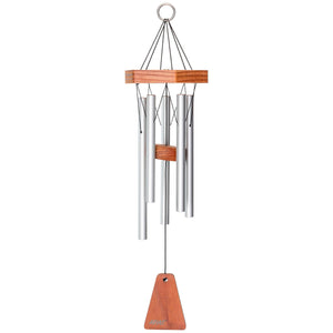 The Arias® 17-inch Windchime in Satin Silver features cylindrical tubes hanging below a hexagonal wooden top. The central wooden piece holds a triangular clapper at the bottom, making this wood and metal chime perfect as durable patio decor.