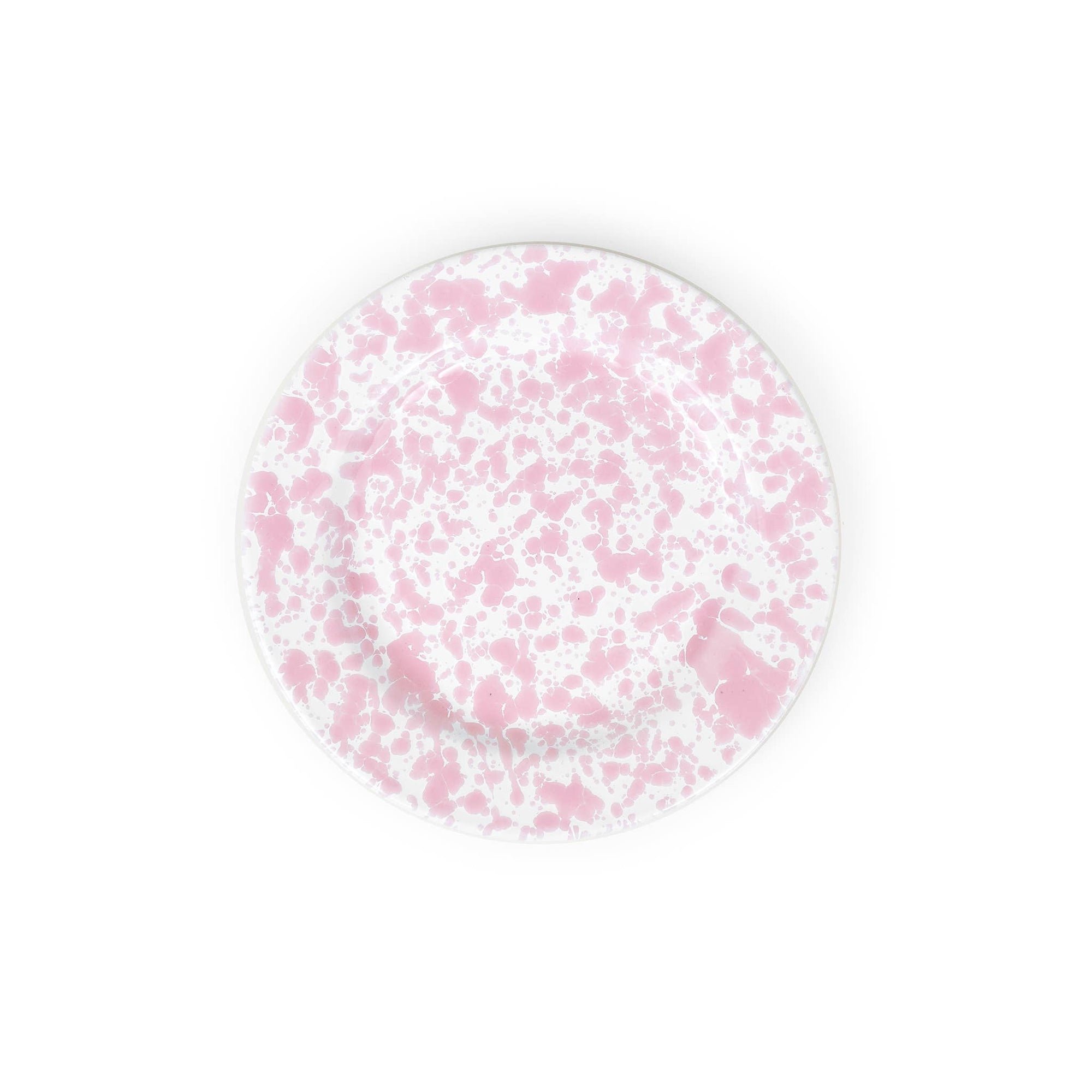 The Splatter Enamelware Flat Salad Plate is a versatile round plate with a white base and a pink speckled pattern, crafted from durable enamelware.