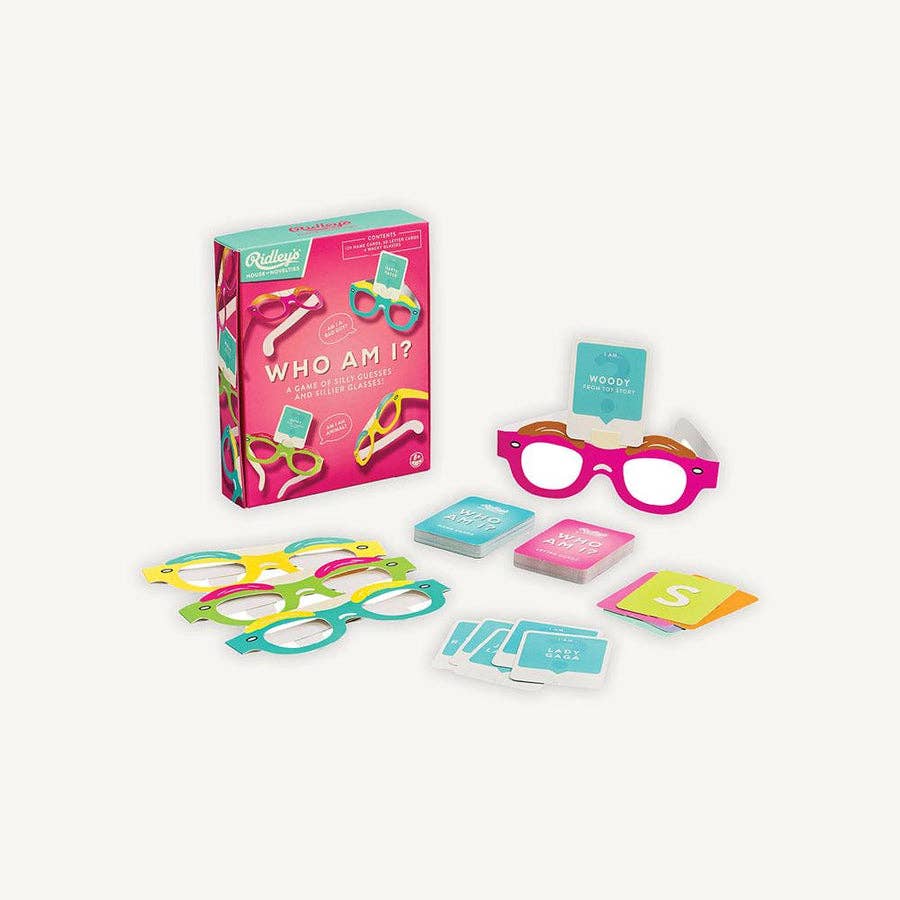 A silly game called "Who Am I?" that combines glasses, cards, and a box for players to make their hilarious guesses.